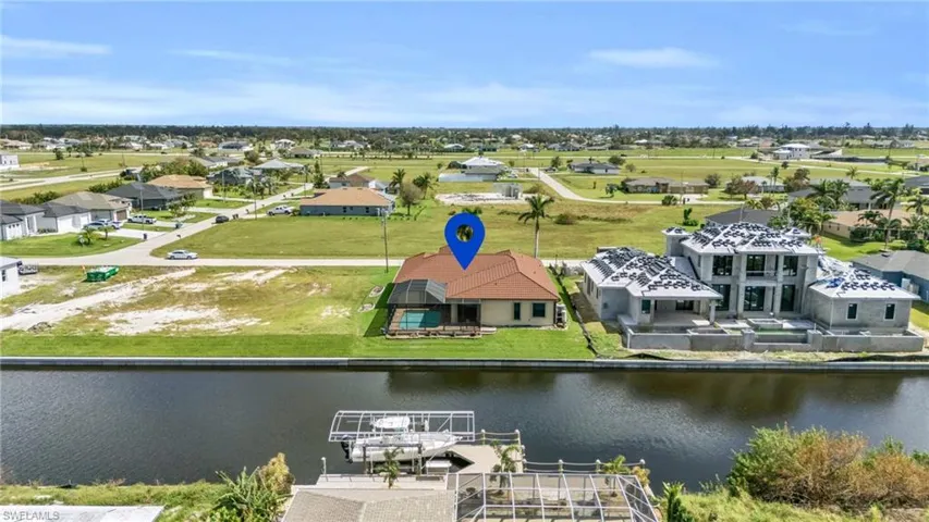 Drone / aerial view with a gulf access canal view