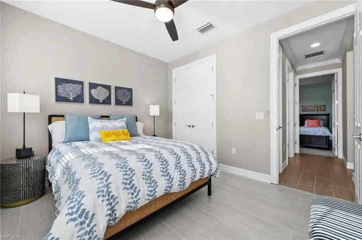 Bedroom featuring a closet and ceiling fan