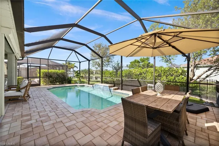 View of pool featuring a lanai and a patio