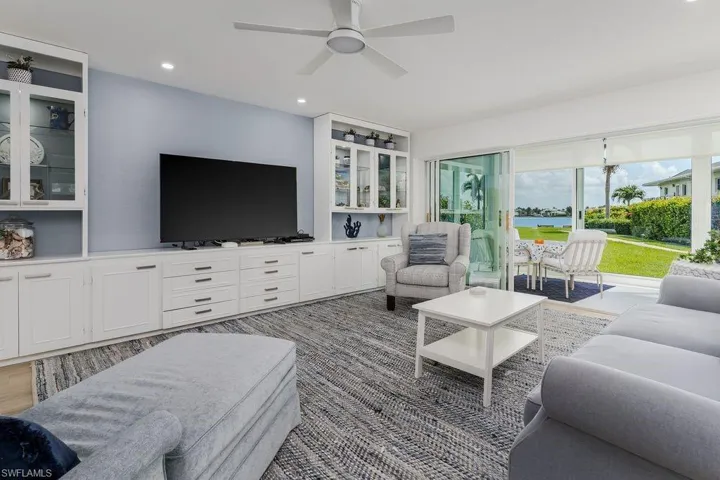 Absolutely serene soft blue.... flows out to the green lawn off sunroom