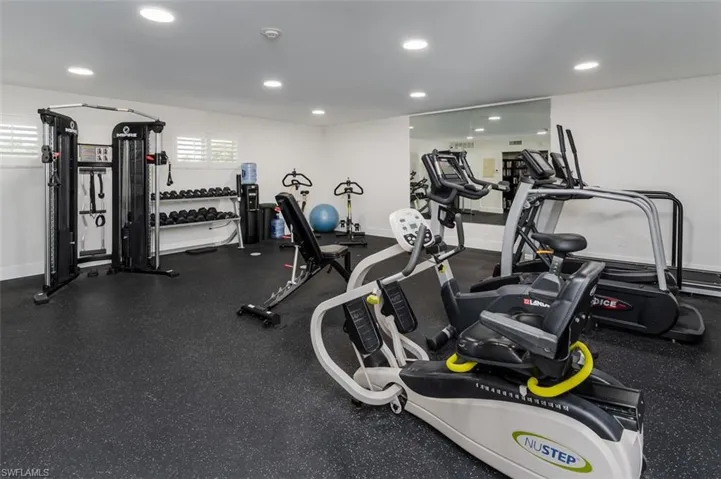 Gym is across the hallway from unit's front door.