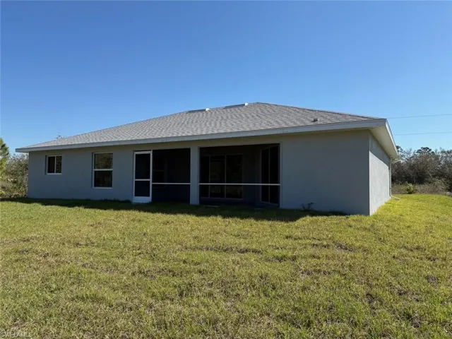 809 Poinsettia Ave, Lehigh Acres Fl 33972