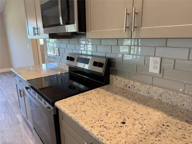 809 Poinsettia Ave, Lehigh Acres Fl 33972