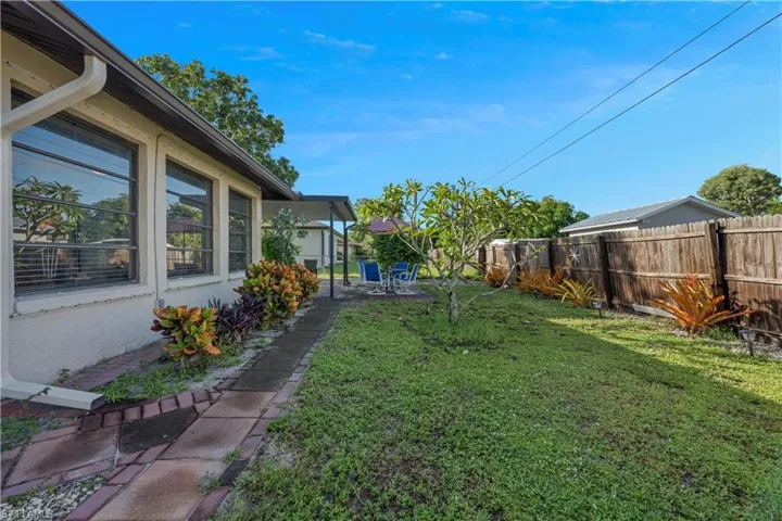 View of fenced backyard