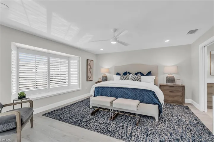 Master Bedroom #1 Spacious master retreat furnished for comfort and style - Virtually Edited Image