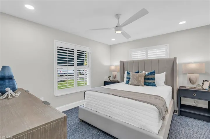 Guest Bedroom #1 Bright and airy bedroom with a modern aesthetic - Virtually Edited Image