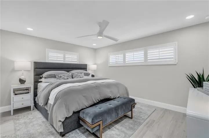 Master Bedroom #2 Comfortable bedroom with ample natural light and a peaceful ambiance - Virtually Edited Image