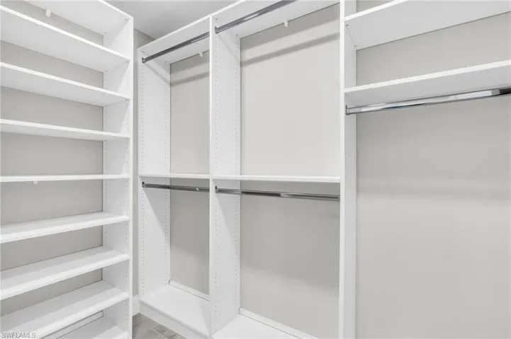 Master #1 Closet Walk-in closet designed for optimal organization and storage - Virtually Edited Image
