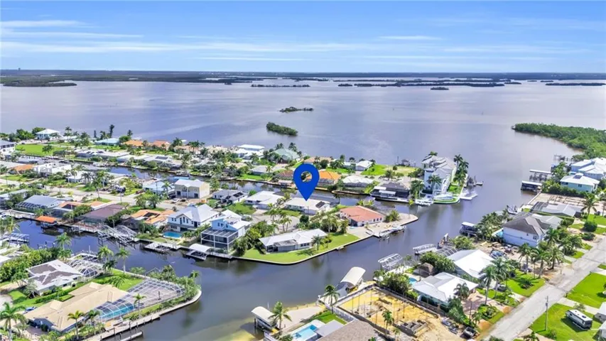 Ideally situated waterfront home with easy access to the Gulf - Virtually Edited Image