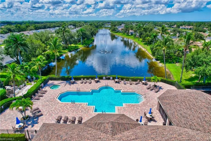 Bird's eye view of a large body of water and a pool area