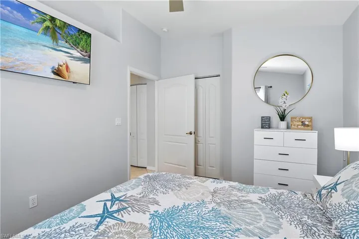 Bedroom with a closet and a ceiling fan