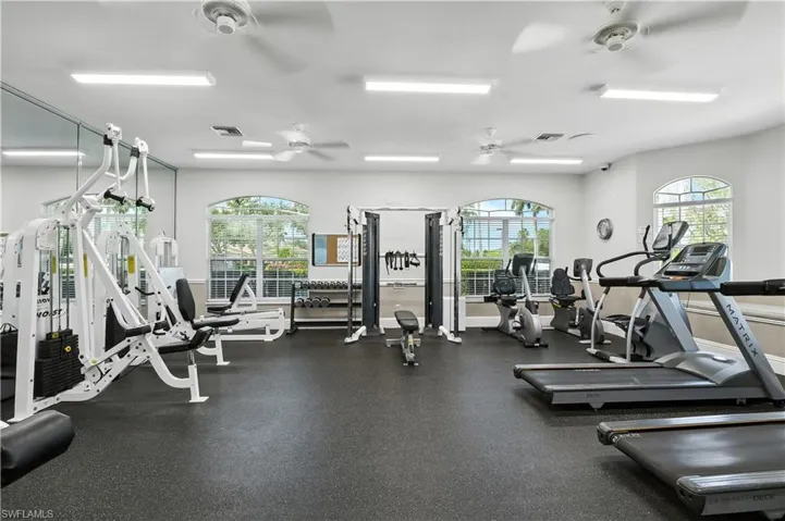 Exercise room with ceiling fan