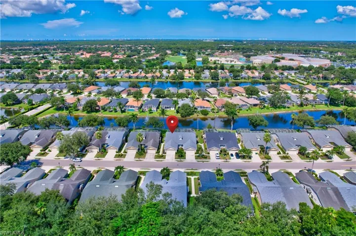 View of property location featuring nearby suburban area and a large body of water