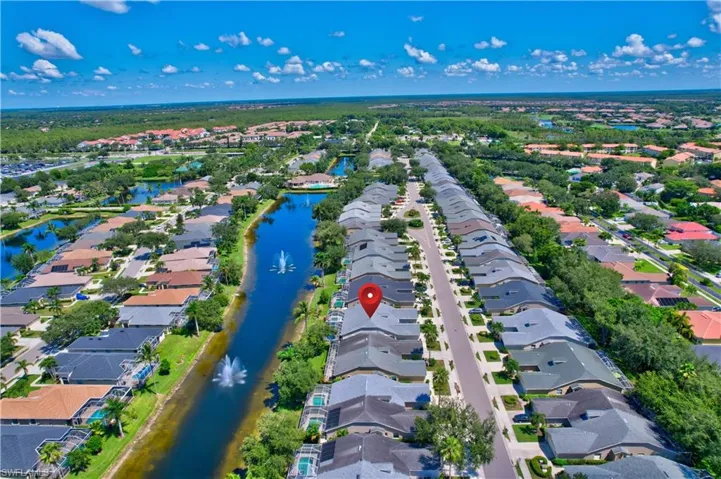 Aerial view of residential area with a large body of water