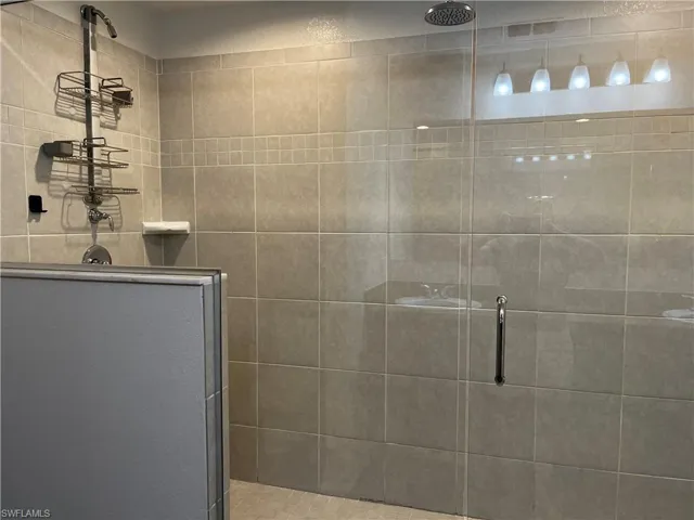Bathroom with an enclosed shower