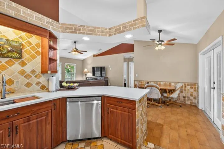 Kitchen featuring NEW Quartz countertops and sink