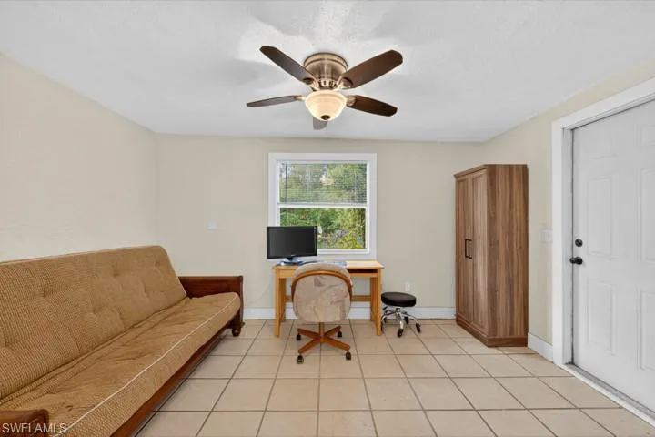 Office/Den/Playroom with tile floors, ceiling fan, and easy access for visiting clients