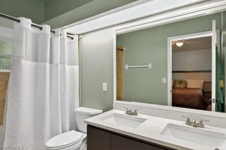 Primary Bathroom with NEW Quartz Countertops (color is soft sage green)