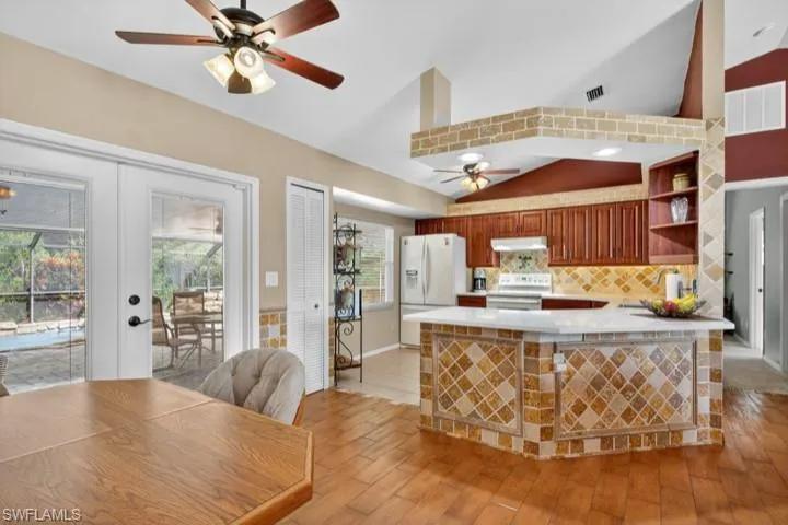 Kitchen featuring NEW Quartz countertops and sink
