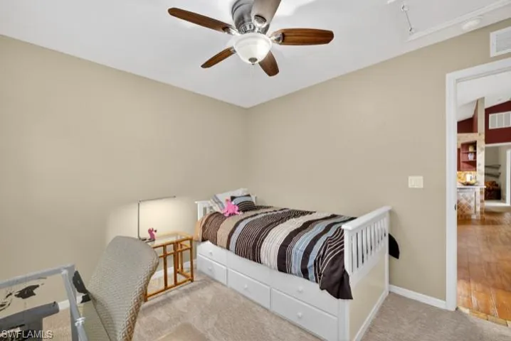 Guest Bedroom 3 with carpet and ceiling fan