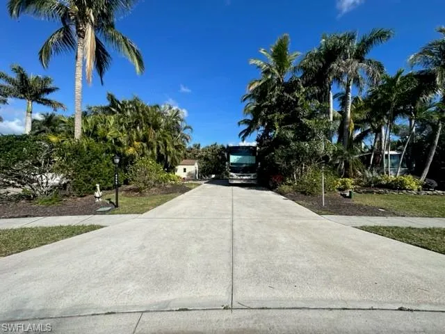 View of front of home featuring concrete driveway