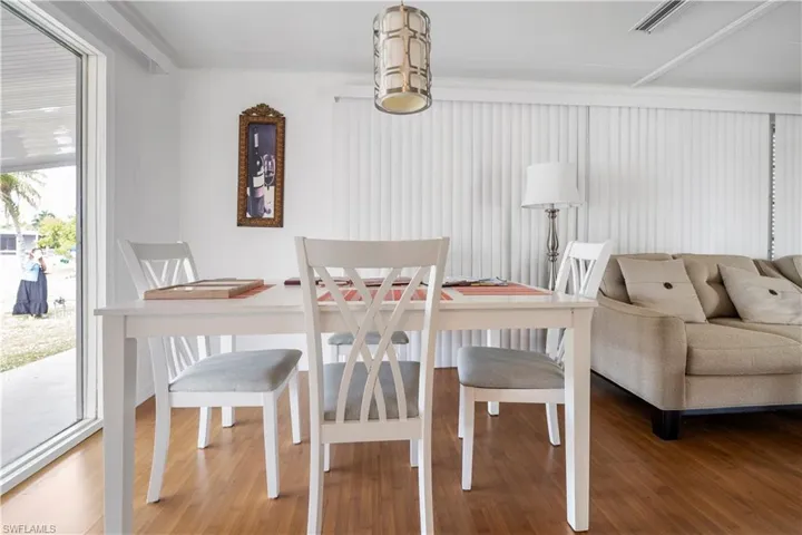 Dining space with wood finished floors