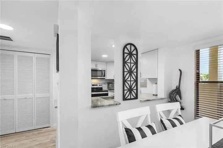 Dining space featuring recessed lighting, light wood-type flooring, and visible vents