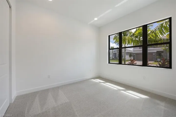 View of carpeted spare room