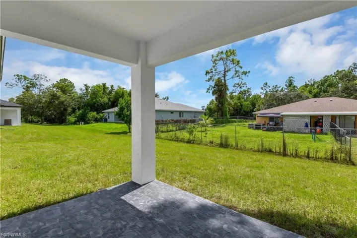 View of yard with a patio area