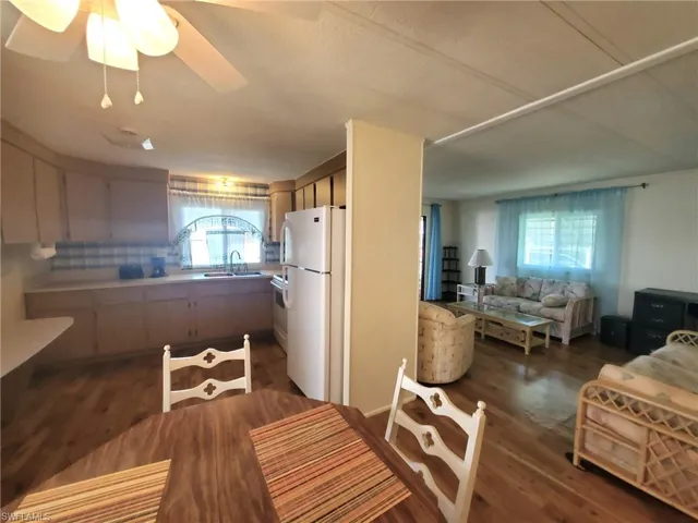 View of Kitchen, Dining, & Living Rooms
