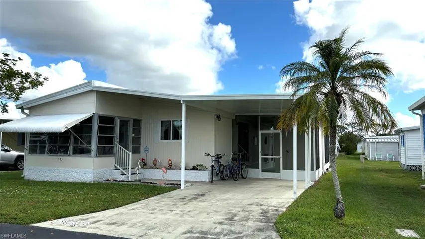 Immaculate 2 Bedroom 2 Full Bathroom double-wide with nearly 1000 sf of air-conditioned living space and a sunny Florida Room is PRICED RIGHT and ready to sell NOW!