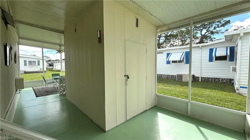 Breezeway storage & laundry shed.