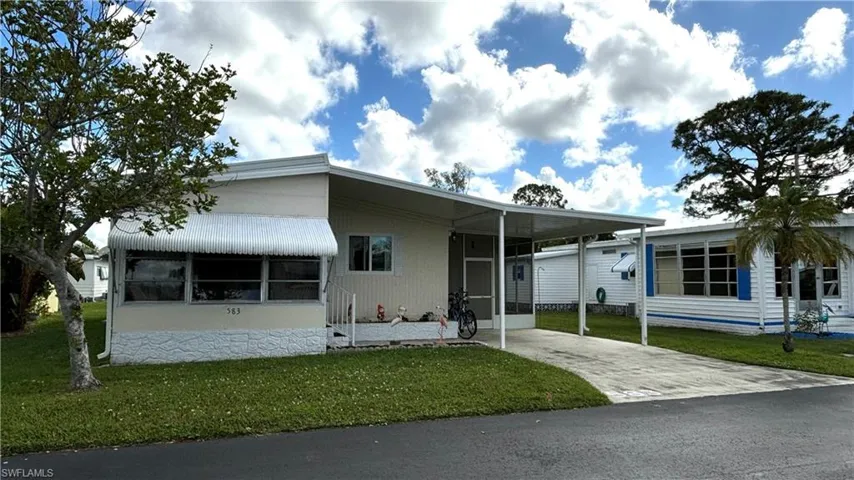 Own your land AND this well-maintained home while you Enjoy AFFORDABLE LIVING in the Sunshine State in this pet-friendly, people-friendly 55+ Community with shuffleboard, ponds, mature landscaping, and street lights.