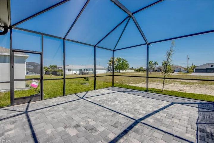 Unfurnished sunroom with a residential view