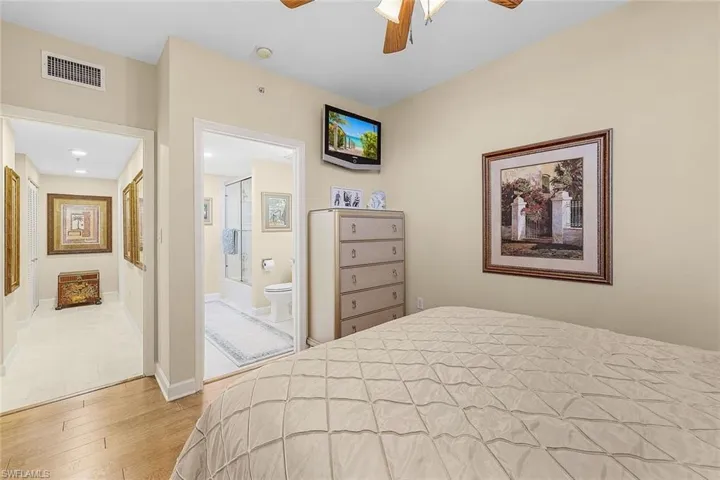 Bedroom featuring light wood-style flooring and a ceiling fan