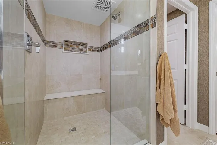 Full bathroom with a stall shower
