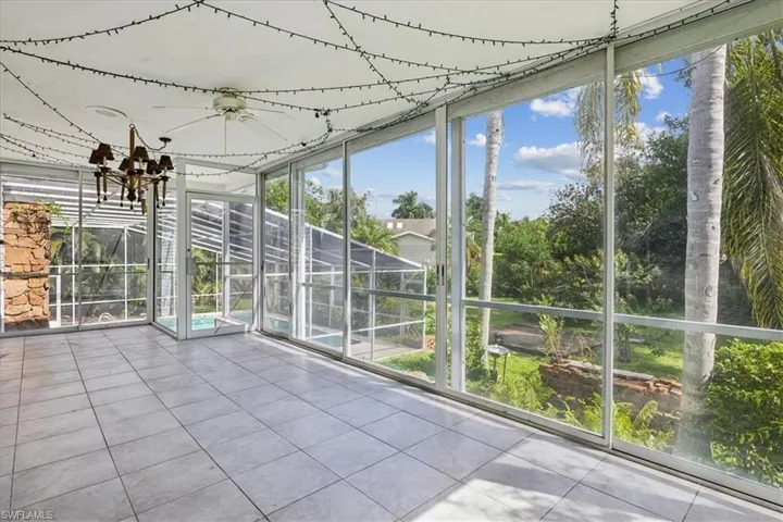 Unfurnished sunroom with plenty of natural light