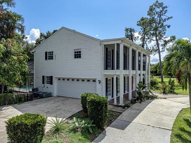 View of home's exterior featuring a garage