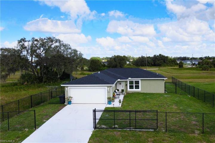 Front View, fenced all around the property including gate and elevation