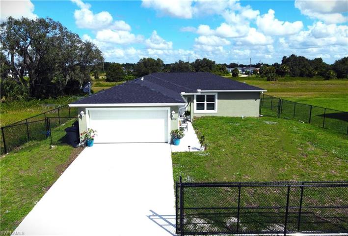 Front View surrounded with fence and gate for more security