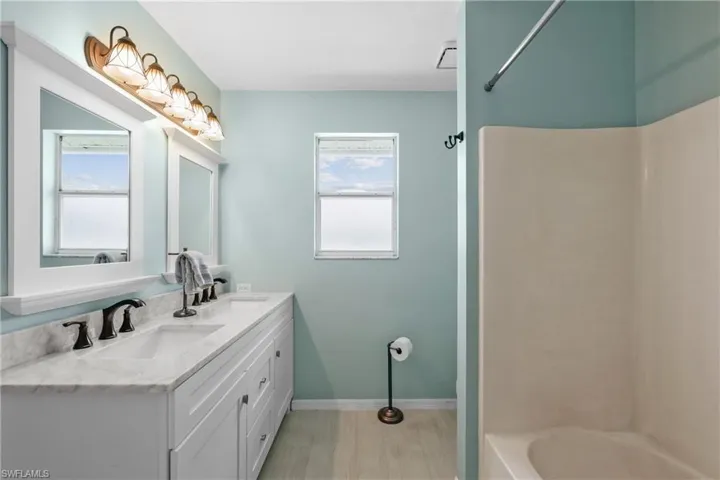 New dual bowl Vanity + ceramic plank Tile Flooring