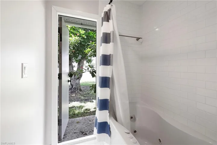 New Impact Pool Bath Door to Backyard