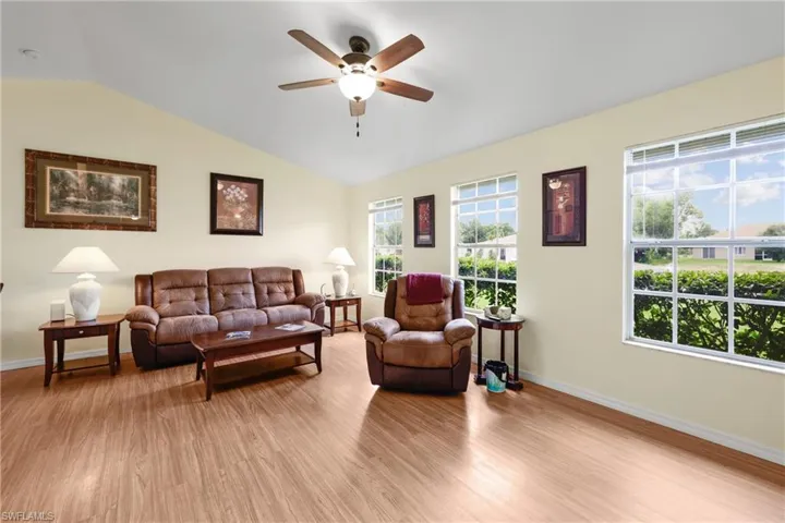 Living Room featuring Lofted Ceiling