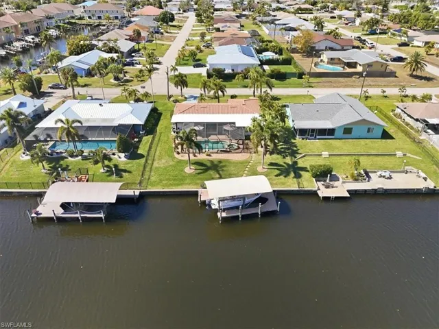 Aerial view of residential area with a large body of water
