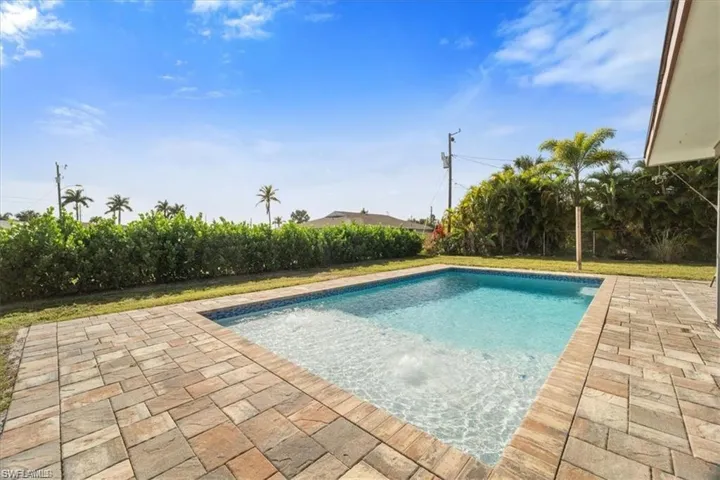 Outdoor pool featuring a patio area