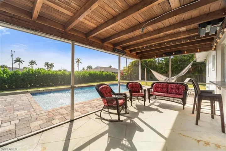 View of patio featuring an outdoor hangout area