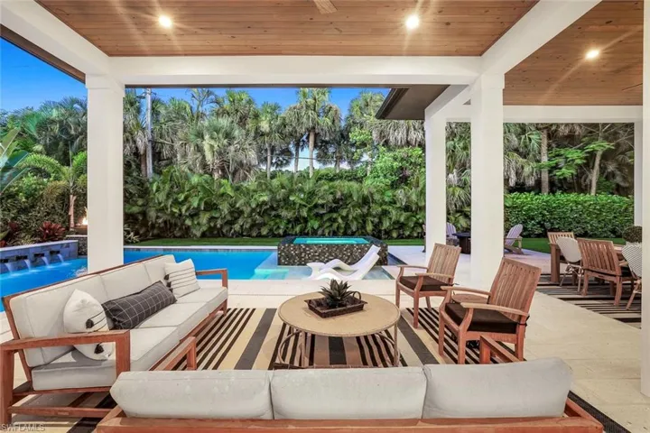 Swimming pool featuring a patio and outdoor lounge area