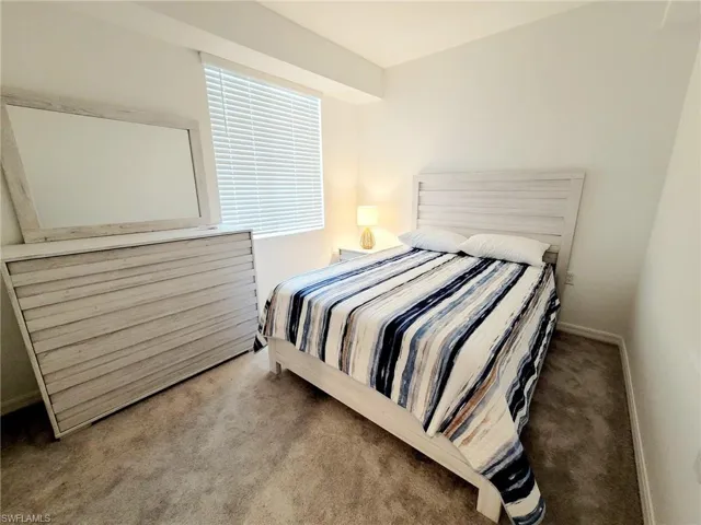 Bedroom featuring carpet flooring