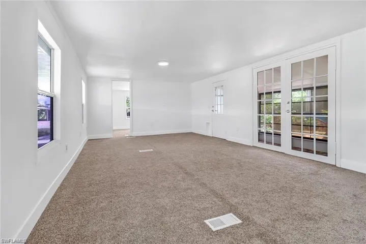 room featuring carpet floors and baseboards