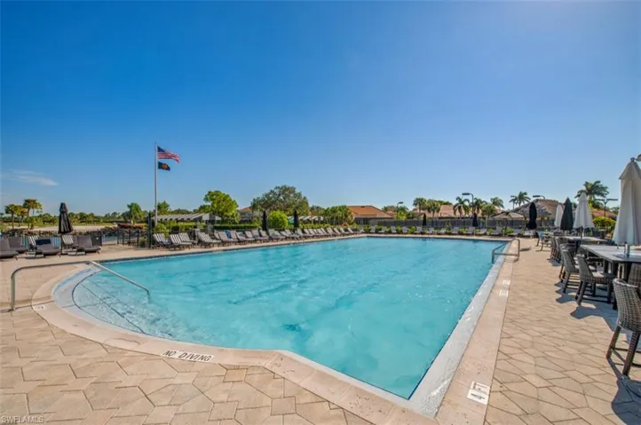 Community pool featuring a patio area